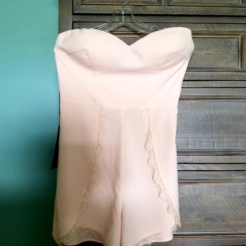 Bebe peach /nude romper new with tags sure 12